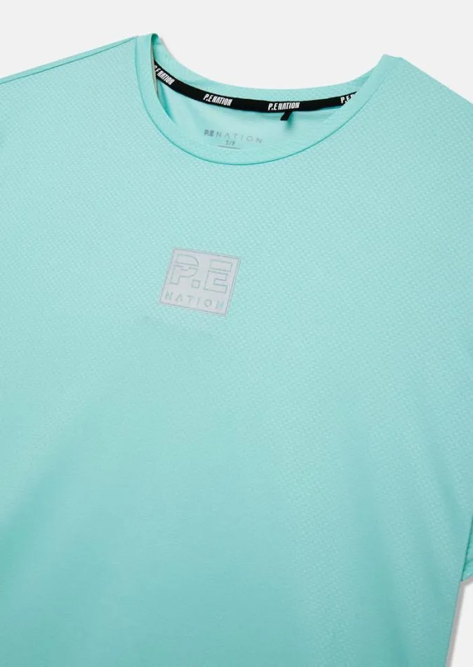 Shop CROSSOVER AIR FORM TEE IN AQUA PE Nation Tees and Tanks